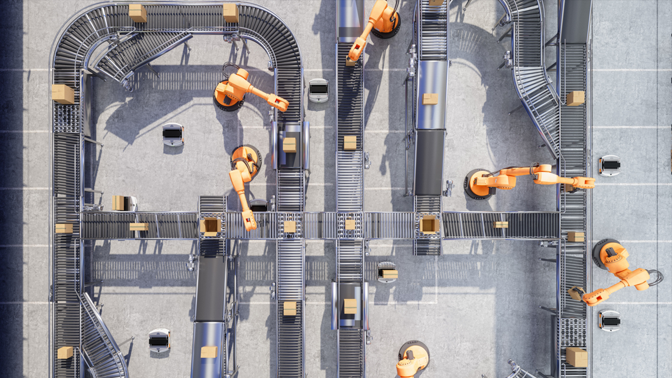 Automated warehouse with robotic arms and conveyor belts representing AI-driven enterprise operations